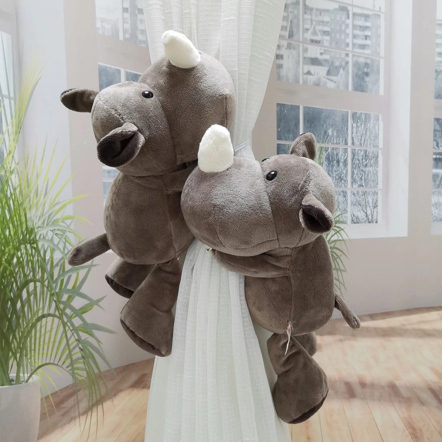 Embrasse rideau rhinocéros L'atelier Rideau