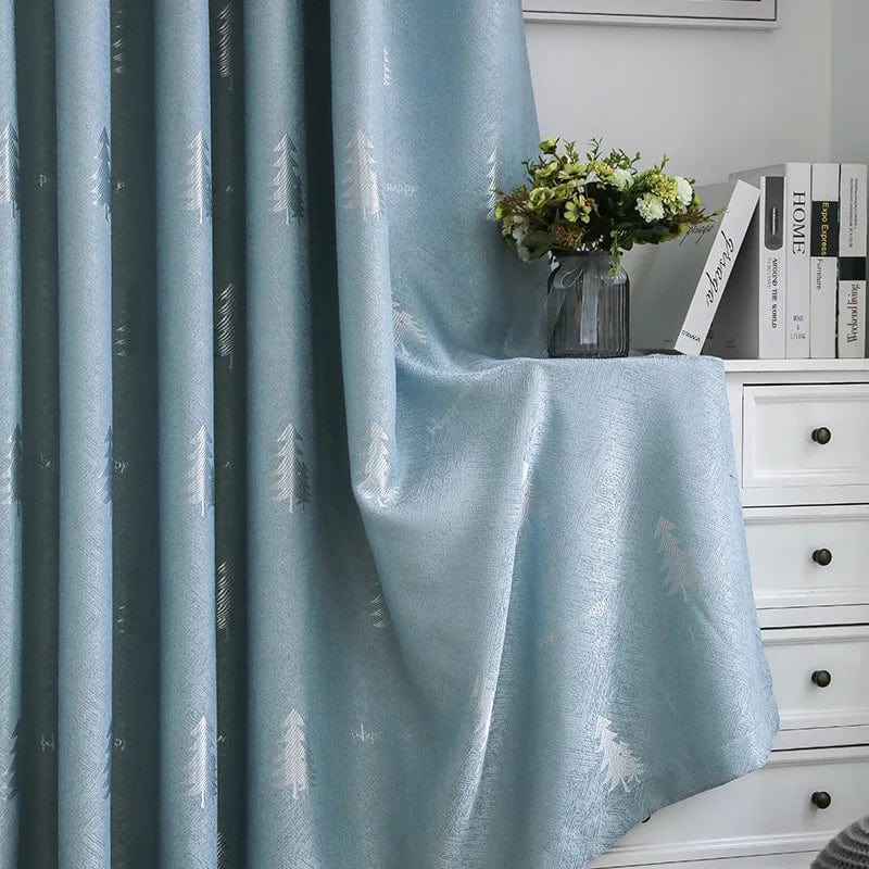 Rideau salon bleu à motifs sapins L'atelier Rideau